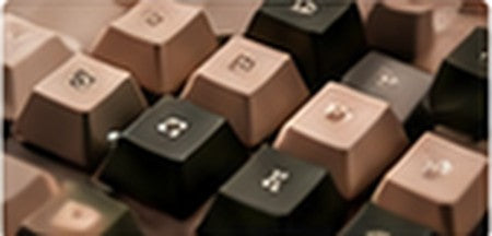 Assorted beige and dark keycaps